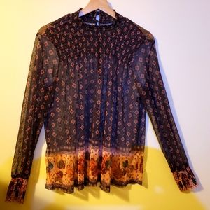 Sexy and sophisticated sheer Maurices blouse